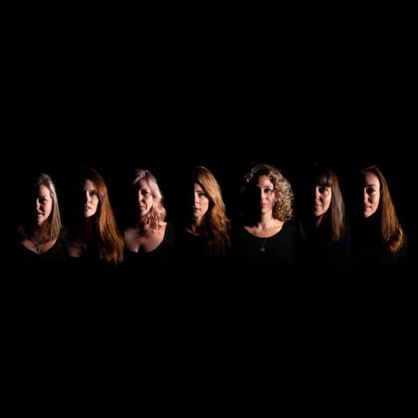 Seven headshots of Kana members on a black background.